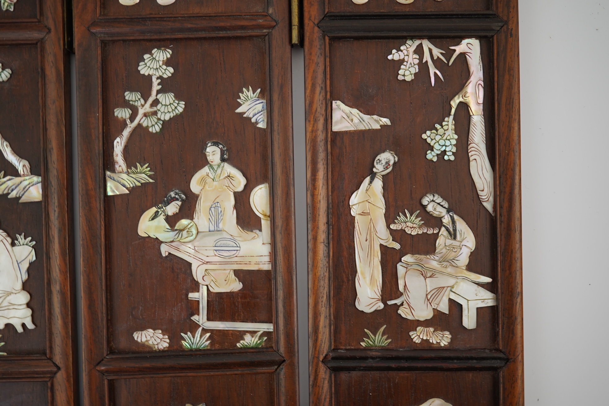 A Chinese mother-of-pearl overlaid hardwood miniature table screen, 19th century